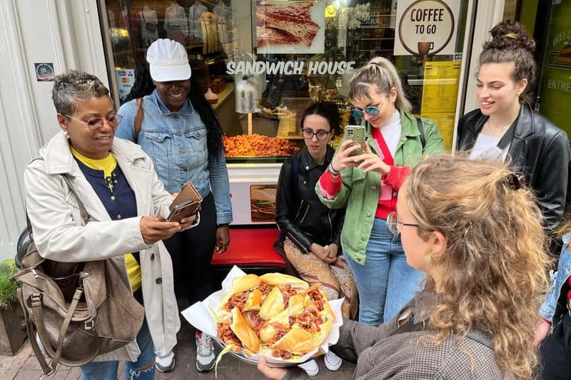 Amsterdam: Guided Food Tour with Tastings - Why weekends and rainy days mean walking