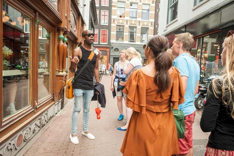 Amsterdam: Guided Ganja Walking Tour of Coffee Shops - University Library and the Flower Market