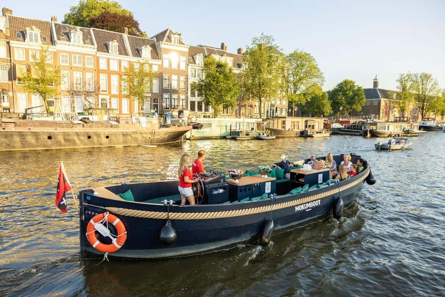 Amsterdam: Guided Open Boat Canal Cruise Including Drink - Why an open boat changes the Amsterdam view