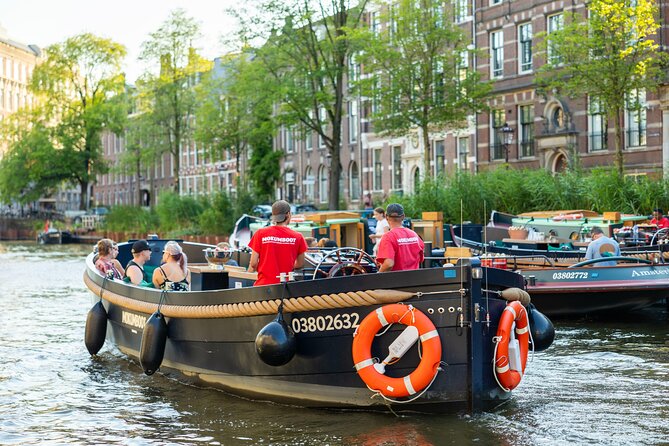 Amsterdam: Guided Open Boat Canal Cruise Unlimited Drinks Option - The Seven Bridges and the Museum Quarter