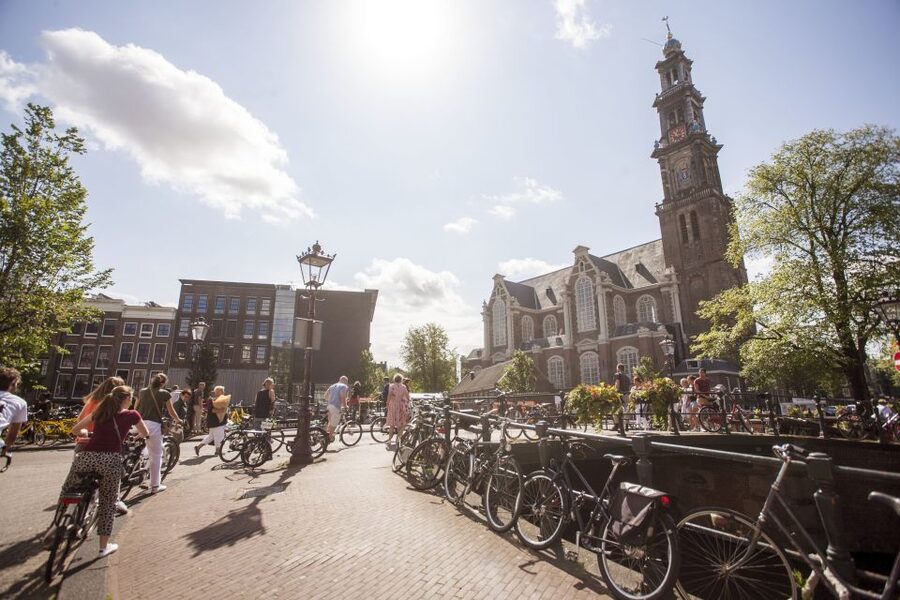 Amsterdam: Hidden Gems & Highlights Guided Bike Tour - Why a bike is the right way to see Amsterdam