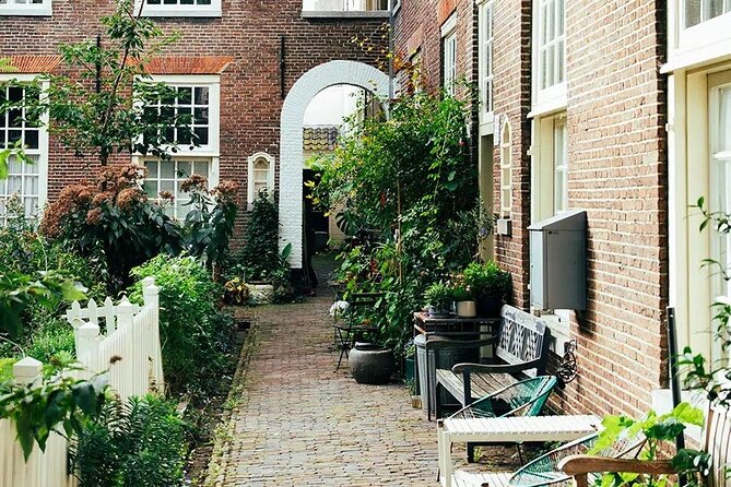 Amsterdam High-End Dutch Food & History Tour - Up to 8 guests - Butcher-shop specialties: ossenworst and grillworst