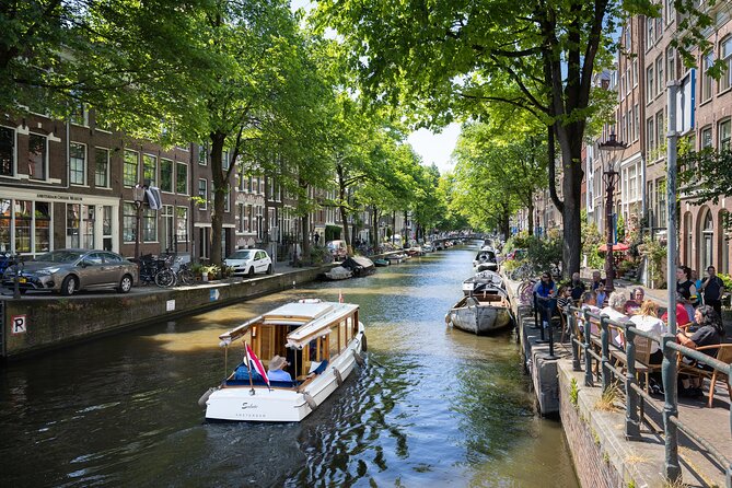 Amsterdam High-End Dutch Food & History Tour - Up to 8 guests - Fish shop classics: herring, cod, and smoked eel