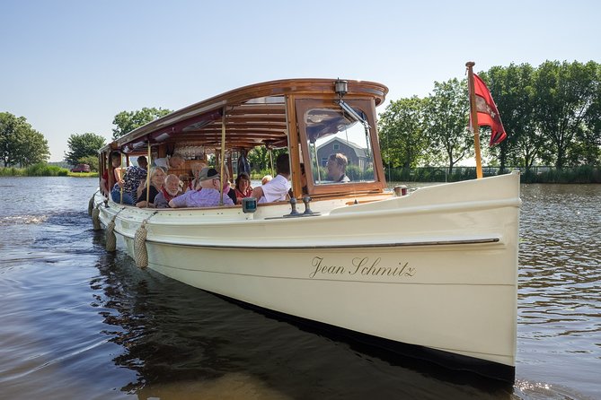 Amsterdam: High Tea Cruise - Windows, weather, and photographs
