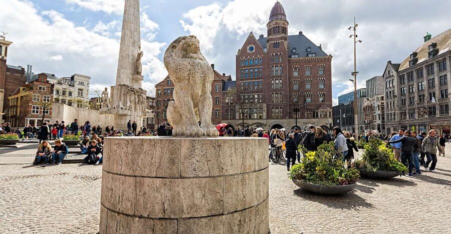 Amsterdam: Historic Walking Tour - Starting at Damrak, where Amsterdam comes into focus