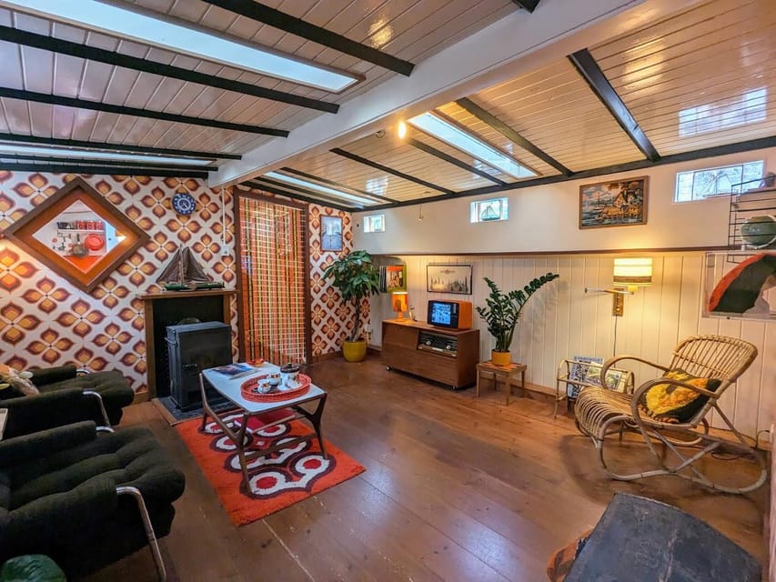 Amsterdam: Houseboat Museum Entry Ticket - The orange, yellow, and brown interior