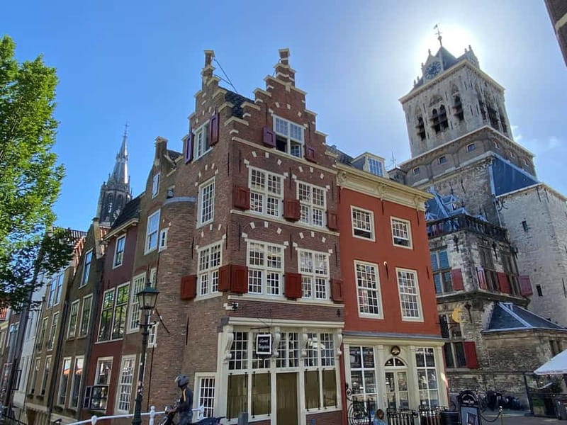 Amsterdam: Kinderdijk, Euromast, Delft and Den Haag Day Tour - Four Dutch highlights packed into one day