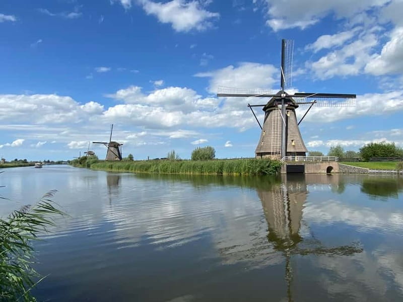 Amsterdam: Kinderdijk, Euromast, Delft and Den Haag Day Tour - Kinderdijk and the engineering behind the windmills