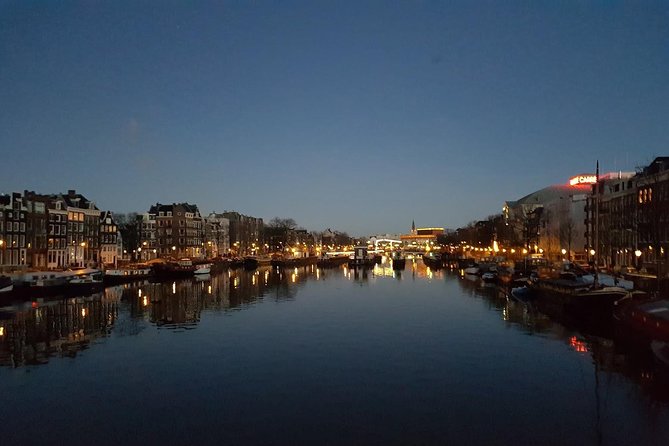 Amsterdam Layover: Airport Transit City Tour - Amsterdam’s central sights: Dam Square, canals, and Centraal Station