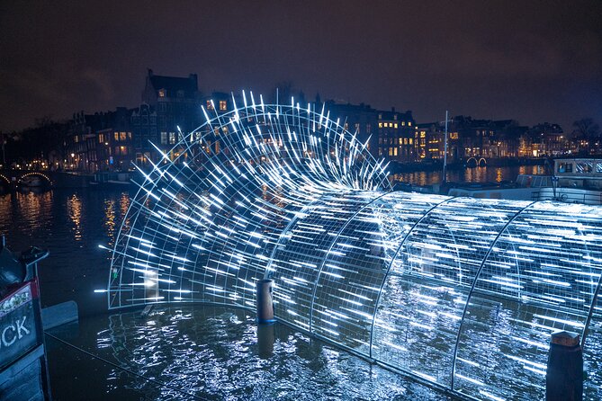 Amsterdam: Light Festival Cruise with Unlimited Drinks Option - NEMO’s bold shape from the water