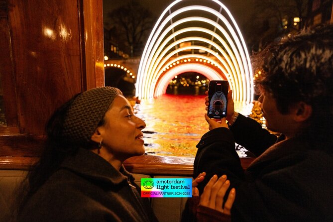 Amsterdam Light Festival: Heated Boat Cruise + Hot Drinks & Bite - How the guide shapes the experience