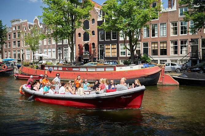 Amsterdam Light Festival: Saloon Boat Cruise + Hot Drinks & Bite - Seeing Amsterdam Light Festival from the Canal Ring