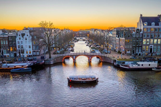Amsterdam: Light Festival Shared Boat with unlimited drinks - Boarding at Stationsplein 40