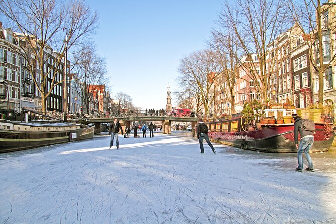 Amsterdam Light Festival Winter Walk with Stroopwafel Workshop - From the Munttoren to the Flower Market