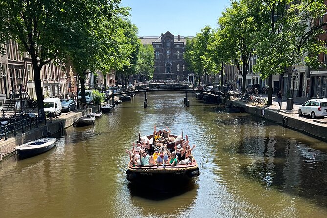 Amsterdam Luxury Boutique Boat tour with Unlimited Beer and Wine - A short canal cruise with a party atmosphere
