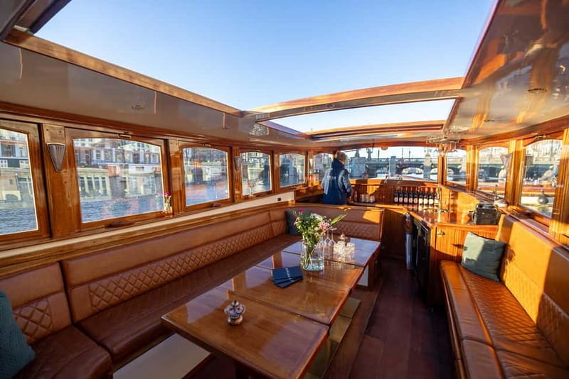 Amsterdam: Luxury Canal Cruise with Optional Snacks & Drinks - Choosing the best time and preparing for the weather