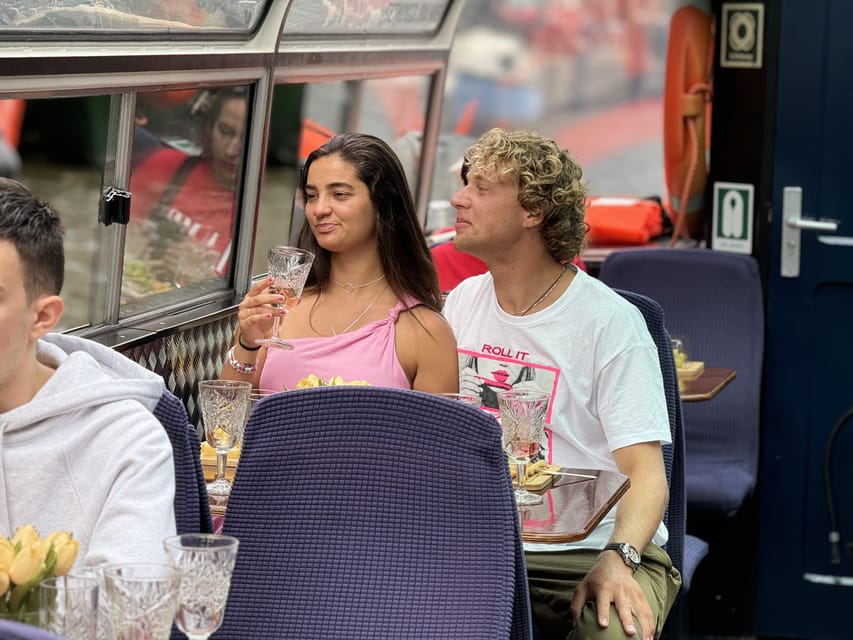 Amsterdam: Luxury Cheese & Wine Canal Cruise - Canal views with a slower rhythm