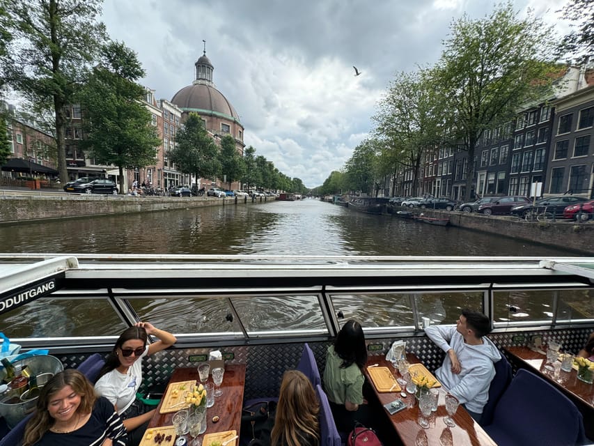 Amsterdam: Luxury Cheese & Wine Canal Cruise - The one-hour timing and possible delays