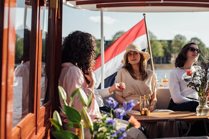 Amsterdam: Luxury Saloon Boat Cruise with Cocktails & Waffle - Drinks, cocktails, snacks, and the waffle question