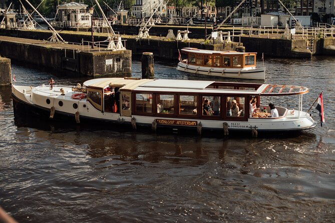 Amsterdam: Luxury Saloon Boat Cruise with Cocktails & Waffle - The open saloon boat and onboard comfort