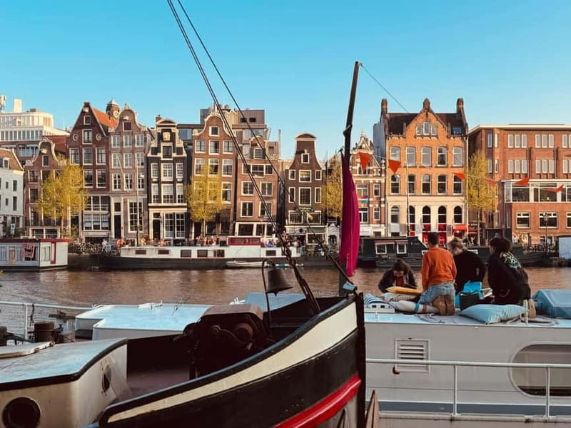 Amsterdam: Off the Beaten Path Bike Tour in French - Key points at a glance