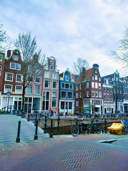 Amsterdam: Off the Beaten Path Bike Tour in French - Magere Brug and the Amstelveld