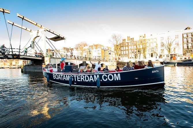 Amsterdam Open Boat Cruise with Live Guide and Two Drinks - Who Should Book This Canal Cruise?