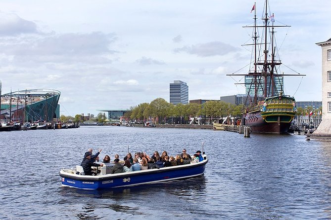 Amsterdam Open Boat Sightseeing Canal Cruise - The Amstel Hotel and Amsterdam’s grander side