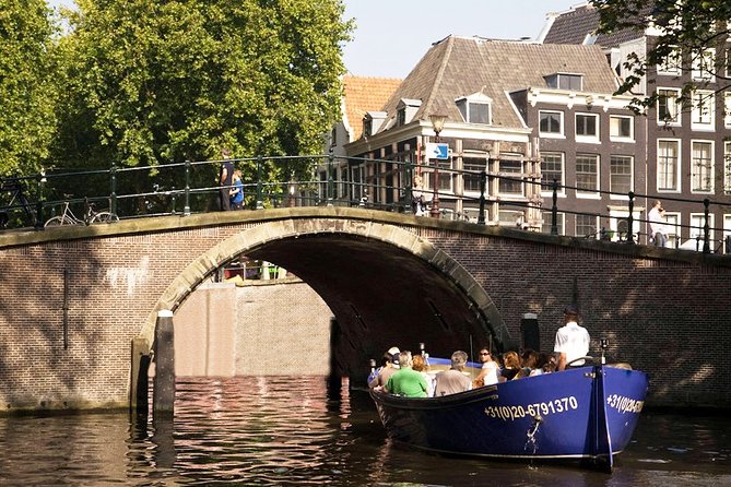 Amsterdam Open Boat Sightseeing Canal Cruise - NEMO, Amsterdam Centraal, and the modern waterfront