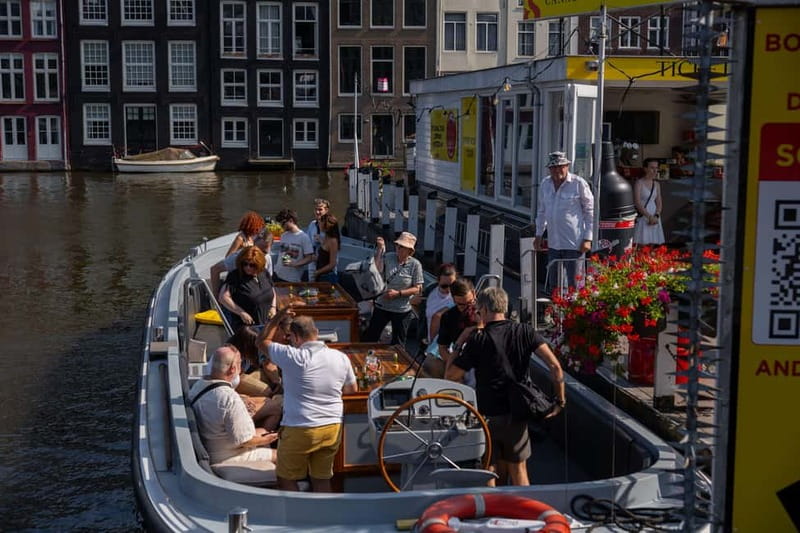 Amsterdam: Open Boat Tour of Canals with Expert Local Guide - Choosing between Damrak, Rijksmuseum, and Prins Hendrikkade