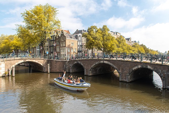 Amsterdam Open Boat Tour with Local Guide - Passing beneath the bridge of love
