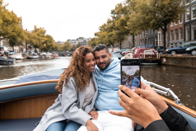 Amsterdam Open Boat Tour with Local Guide - Starting with Amsterdam’s canals at street level