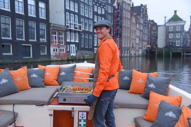 Amsterdam Private BBQ and Drinks Cruise With Onboard Chef - Central Station, Montelbaanstoren, and the waterfront