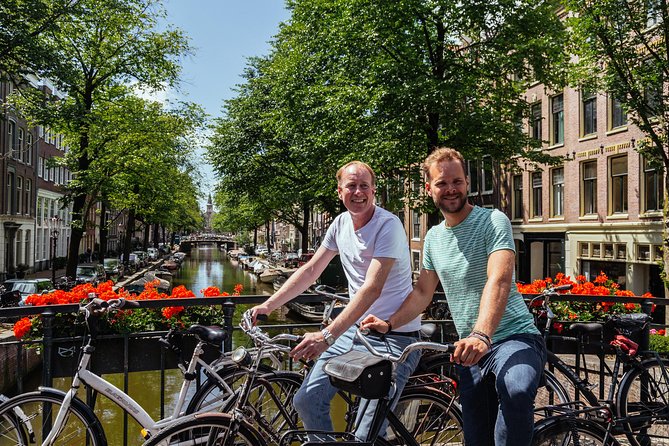 Amsterdam PRIVATE Bike Tour With Locals: Bike & Local Snack Included - The snack stop and the value of local advice