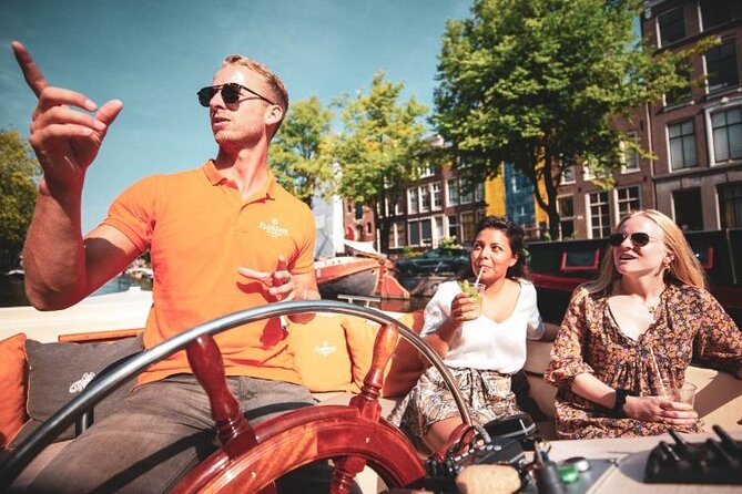 Amsterdam Private Boat Tour with Unlimited Drinks - Museum views: Hermitage Amsterdam and the Rijksmuseum