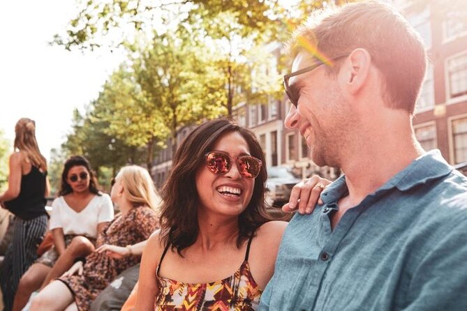 Amsterdam Private Boat Tour with Unlimited Drinks - Oude Kerk, the Red Light District, and Amsterdam’s oldest canals