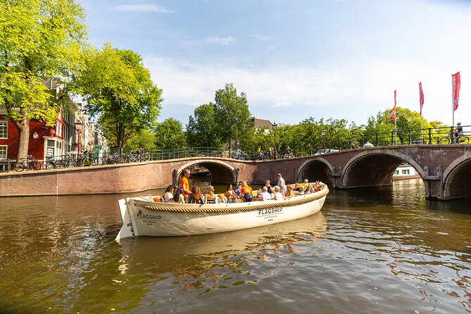 Amsterdam Private Boat Trip with Pizza and Unlimited Drinks - The canal views you can expect in 90 minutes