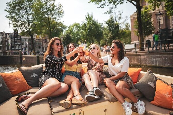 Amsterdam Private Boat Trip with Pizza and Unlimited Drinks - Pizza, wine, beer, and soft drinks on the water