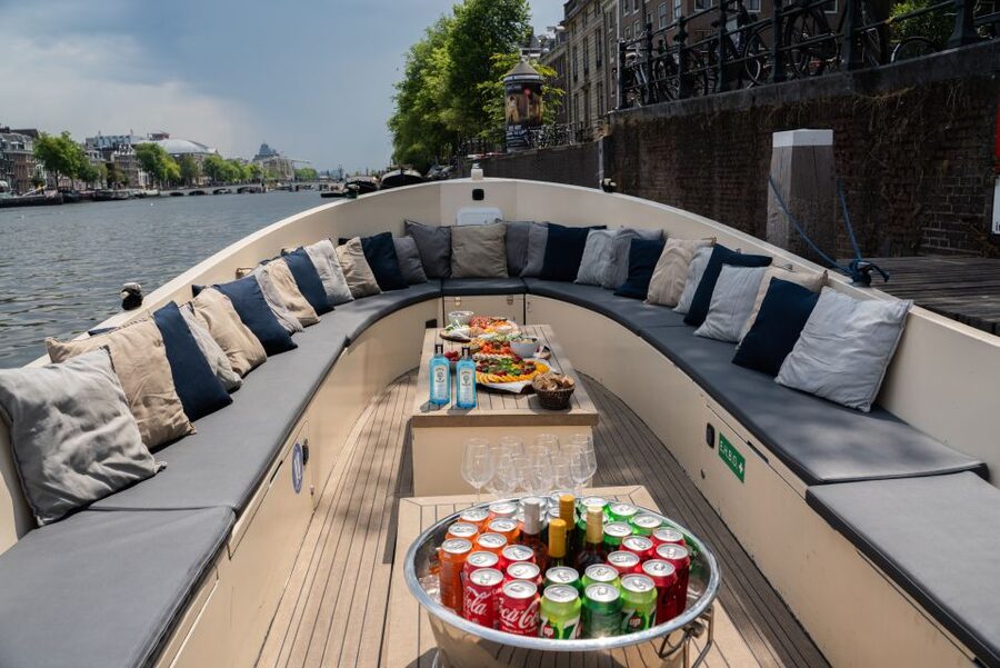 Amsterdam: Private Canal Booze Cruise with Unlimited Drinks - The Red Light District by Canal, About 15 Minutes