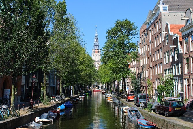 Amsterdam private city walking experience with a local - Dam Square, royal power, and wartime memory