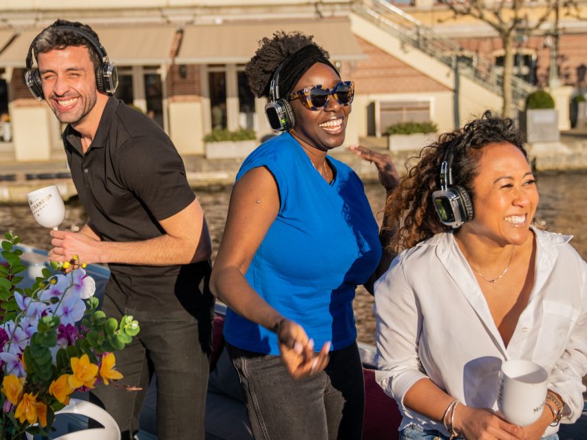 Amsterdam: Private Luxury Cruise with Drinks & Silent Disco - Meeting behind the Apple Store