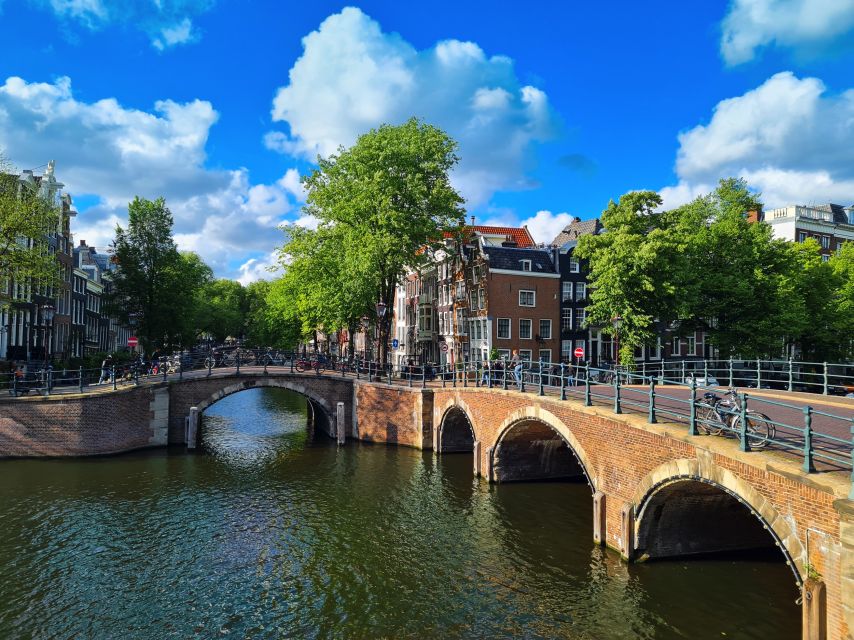 Amsterdam: Private Pedicab Historical Sightseeing Tour - A gentle start at Dam Square