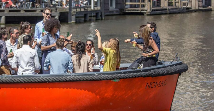Amsterdam: Private Prosecco Canal Cruise Tour - A party boat with Amsterdam views