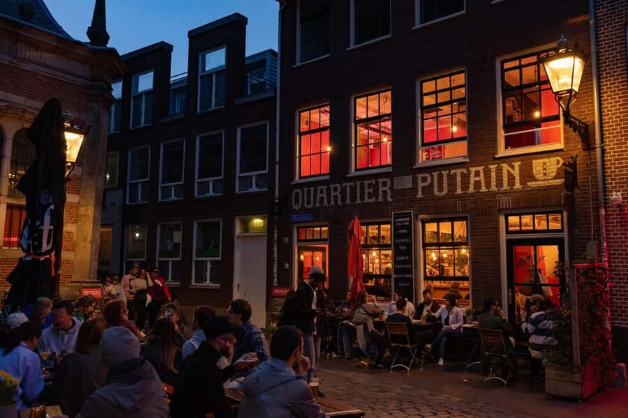Amsterdam: Red Light District Tour in German/English/Italian - Coffeeshop history without an inside visit