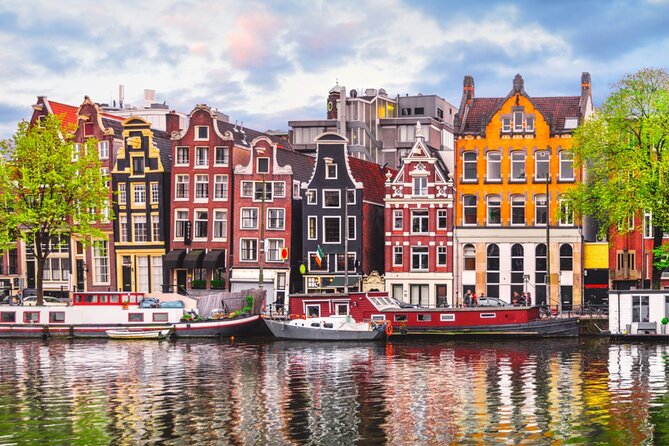 Amsterdam Red Light District Treasure: Self-Guided Tour & Quest - Starting beneath the brick arches of Centraal Station
