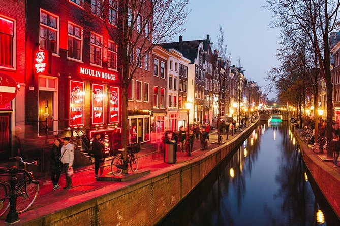 Amsterdam Red Light District Walking Tour in EN/DE/IT/ES - The difficult questions about safety and exploitation