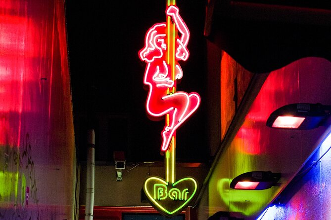 Amsterdam Red Light District Walking Tour in EN/DE/IT/ES - The Condomerie and a more useful side of the story
