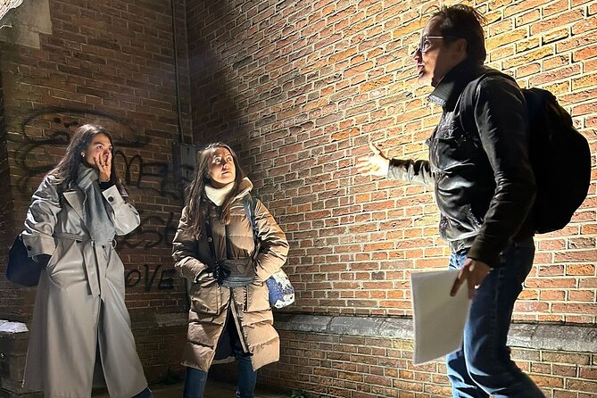 Amsterdam’s Ghostly Experiences Group Tour - Nieuwe Kerk and Royal Palace: grand buildings with grim surroundings