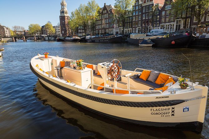 Amsterdam: Saloon Boat Cruise + Unlimited Drinks & Bite option - The Drunken Houses and the city’s odd details