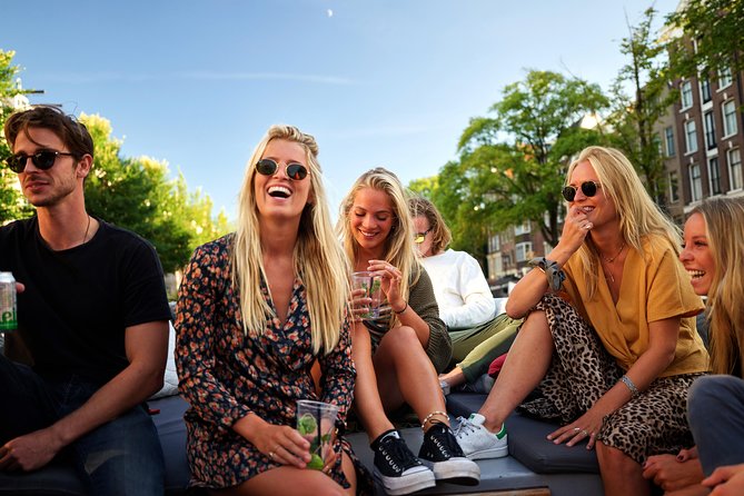 Amsterdam: Saloon Boat Cruise + Unlimited Drinks & Bite option - The rare view through several bridges